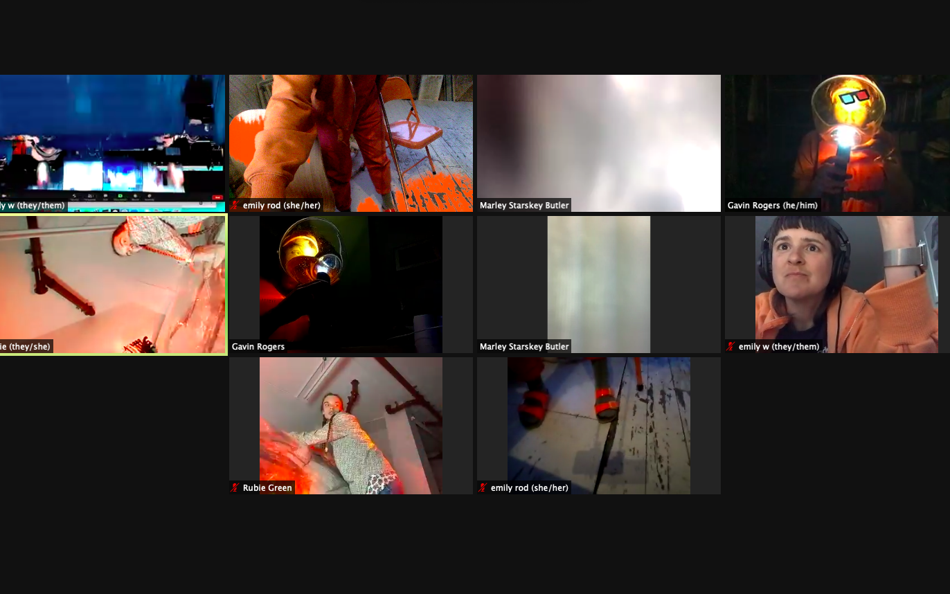 Screenshot of a group zoom call. 10 windows show various orange objects and people wearing orange.